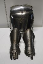 A late 18th early/19th century Bavarian cuirassier back plate and a pair of metal