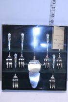 A cased Royal Albert Old Country Roses cake cutlery set