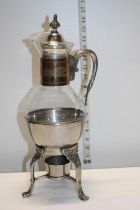 A Middle Eastern glass jug with burner shipping unavailable