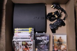 A PS3 console with accessories and games (in working order)