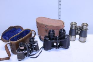 Three pairs of assorted vintage binoculars