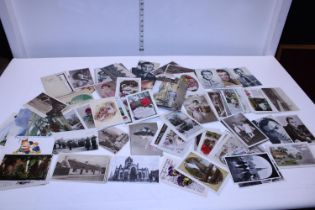A selection of vintage and antique postcards etc