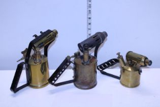Three vintage brass blow torches