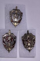 Three Russian enamelled badges