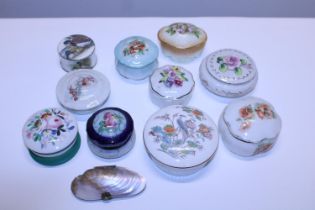 A selection of assorted antique and vintage trinket pots