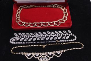 A boxed costume jewellery necklace and other costume jewellery