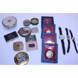 A selection of vintage compacts including musical example, with pocket watches and other