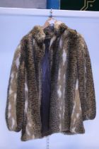 A ladies Astraka fur coat