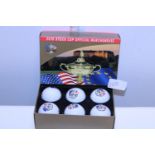 A box set of six 2010 Ryder Cup Golf Balls