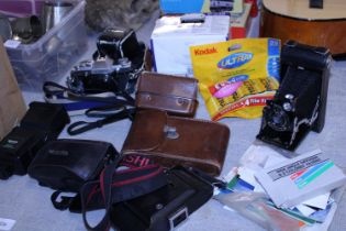 A job lot of vintage cameras and accessories