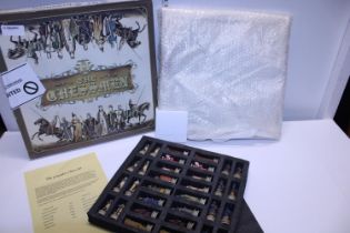 A boxed as new 'Chessmen' set with board