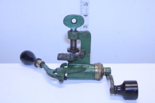 A 12 bore cartridge roll turnover tool