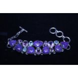 A 925 silver bracelet and coloured stones