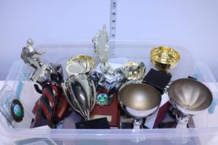 A box of sporting trophies etc