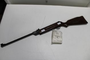 A vintage Elgamo 0.22 air rifle and selection of BSA targets shipping unavailable