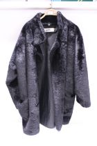 A ladies simulated fur coat size 16