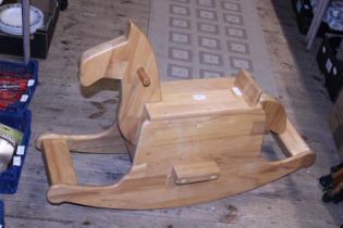 A child's wooden rocking horse, shipping unavailable approx 93x64x28cm