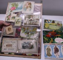 A selection of assorted antique postcards
