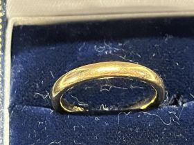 A tests for 22ct gold band ring size M 4.13g