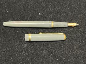 A vintage fountain pen with a 14ct gold nib