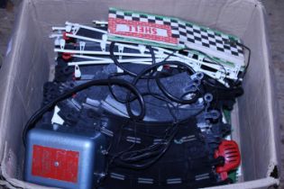 A box full of vintage Scalextric track and accessories. Shipping unavailable