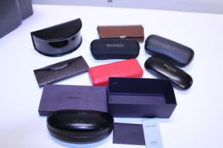 A selection of empty designer glasses cases