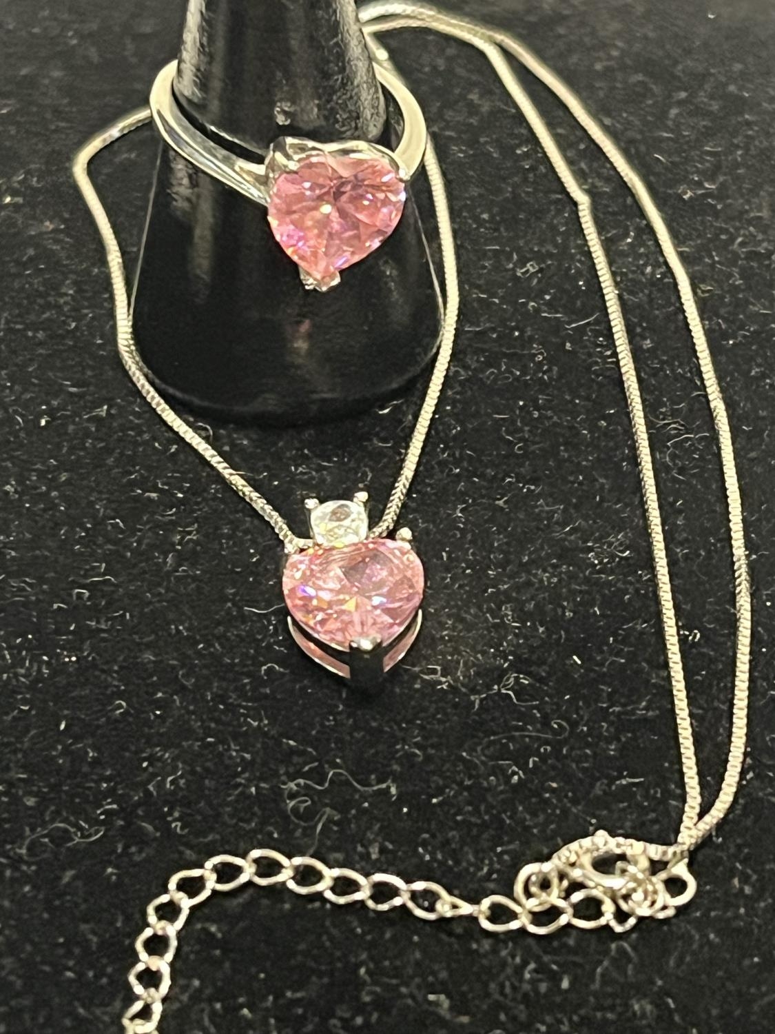 A 925 silver necklace, pendant and ring set with pink stones