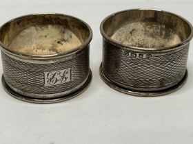Two hallmarked silver napkin rings. 26.61 grams