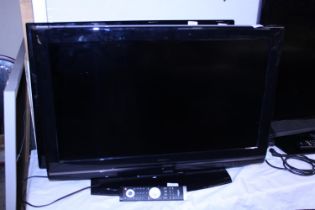 A Hitachi flat screen TV 32" working with remote, shipping unavailable