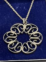 A hallmarked silver chain and pendant