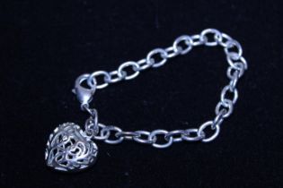 A 925 silver bracelet and heart pendant