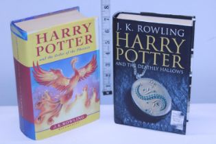 Two Harry Potter first edition hardback books