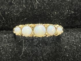 A 9ct gold and opal ring size O 1/2, 2.54g