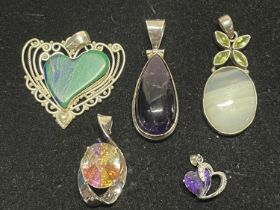 A selection of 925 silver pendants