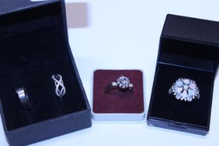 Four assorted 925 silver rings