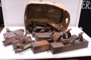 A large job lot of antique woodworking planes. Shipping unavailable
