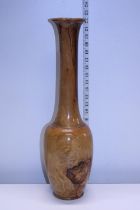 A tall hand turned wooden vase h55cm, shipping unavailable