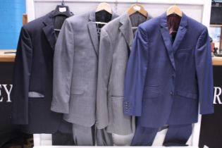 Four assorted men's suits