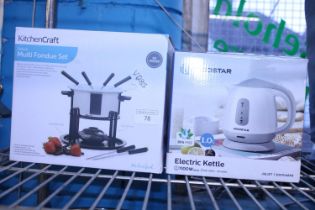 A boxed Fondue set and electric kettle (untested)