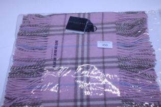 A new with tags Burberry 100% lambs wool pink long scarf with double tassels 150 x 37cm