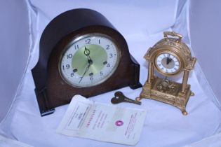 A Smiths Westminster chiming clock and a heavy brass carriage clock