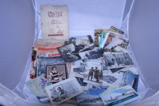 A selection of antique postcards and other ephemera