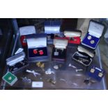 A job lot of assorted tie pins, tie clips and cufflinks