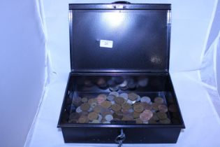 A metal strong box and contents of old coinage