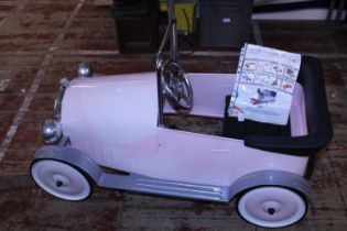 A 2004 tin plate toy pedal brum car 'Pink Princess'. Shipping unavailable