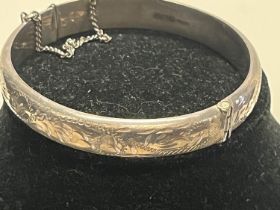 A hallmarked silver bangle. 13.54 grams & 6cm internal diameter