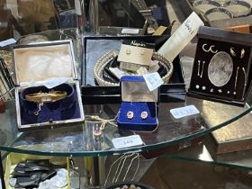 A selection of assorted gold plated jewellery and other costume jewellery
