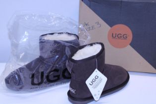 A new pair of Ugg boots size 36