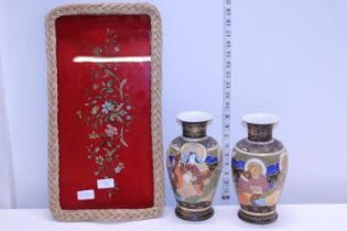 Two Oriental Satsuma vases on a vintage tray