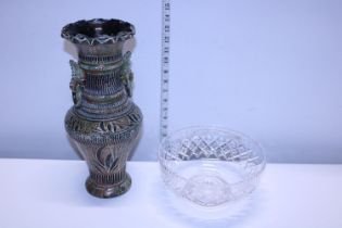 A studio pottery vase and a cut glass crystal bowl. Shipping unavailable